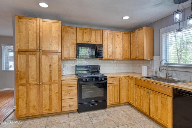 281 S 31st Dr, Show Low, AZ 85901 - kitchen with black appliances, a sink, light countertops, decorative backsplash, and recessed lighting