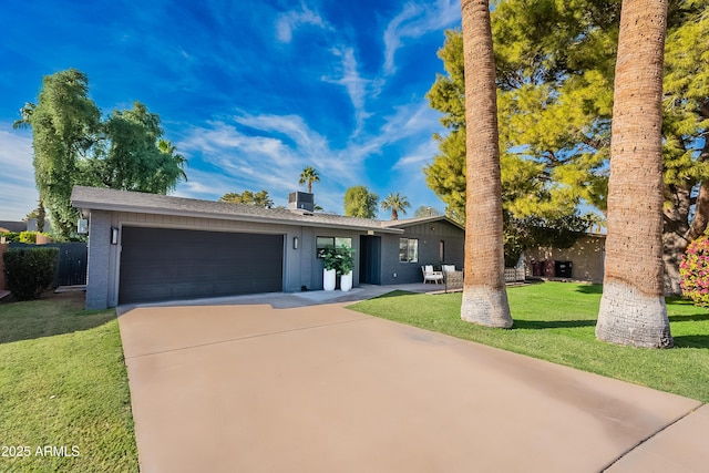 single story home with cooling unit, a garage, and a front yard