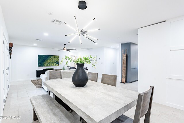 2942 N 81st Pl, Scottsdale, AZ 85251 - dining area with light tile patterned flooring and a chandelier