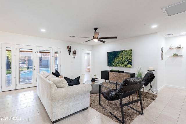2942 N 81st Pl, Scottsdale, AZ 85251 - tiled living room featuring ceiling fan and french doors