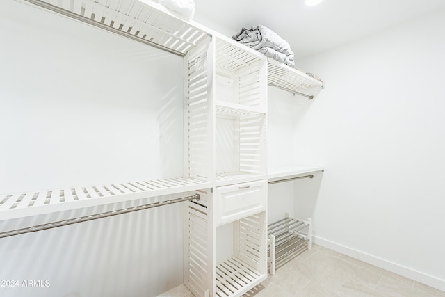 2942 N 81st Pl, Scottsdale, AZ 85251 - spacious closet with light tile patterned flooring