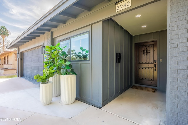 property entrance featuring a garage