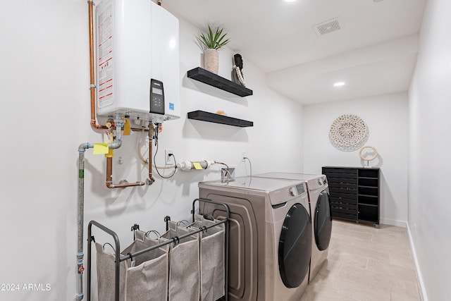 2942 N 81st Pl, Scottsdale, AZ 85251 - washroom featuring water heater and washer and dryer