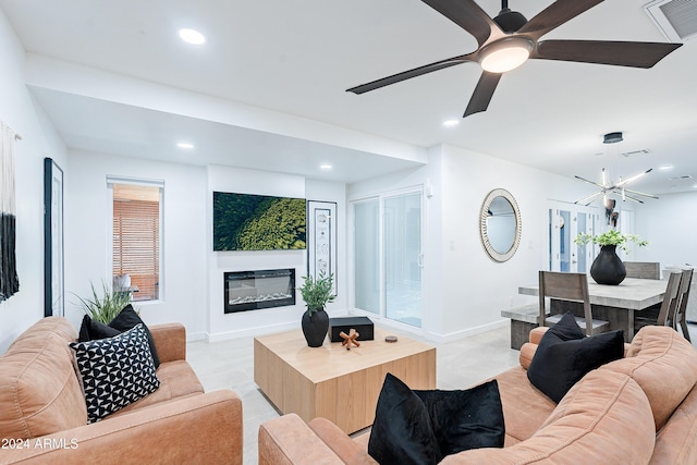 2942 N 81st Pl, Scottsdale, AZ 85251 - living room featuring light tile patterned floors and an inviting chandelier