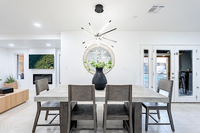 2942 N 81st Pl, Scottsdale, AZ 85251 - tiled dining area featuring a notable chandelier