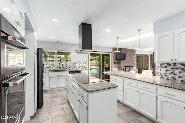 7252 E Edgewood Ave, Mesa, AZ 85208 - kitchen featuring white cabinetry, black electric cooktop, island range hood, and a sink