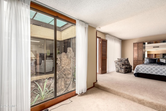 7252 E Edgewood Ave, Mesa, AZ 85208 - bedroom featuring carpet flooring, access to outside, multiple windows, and a textured ceiling