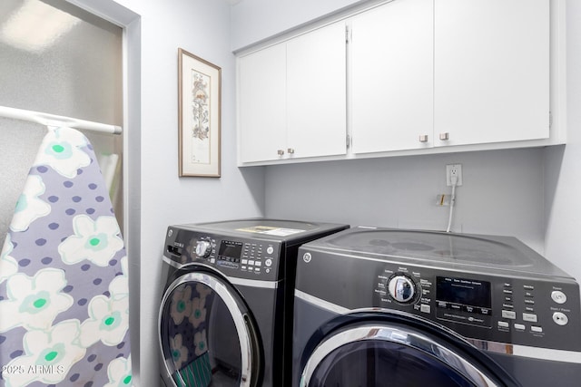 7252 E Edgewood Ave, Mesa, AZ 85208 - clothes washing area featuring washing machine and clothes dryer and cabinet space