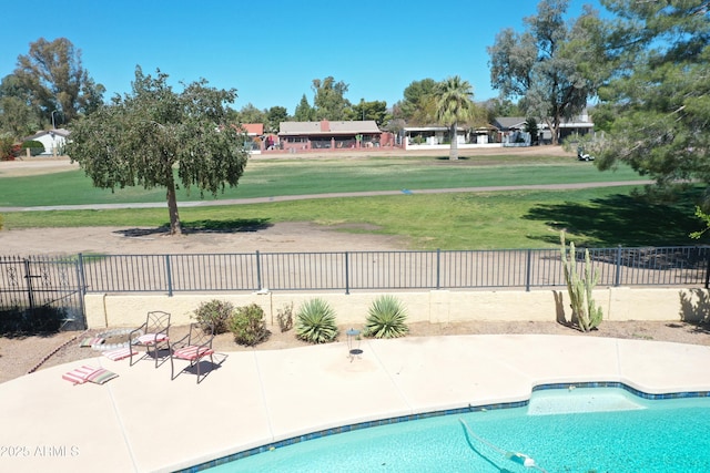 7252 E Edgewood Ave, Mesa, AZ 85208 - view of pool featuring a fenced in pool, fence, a yard, and a patio area