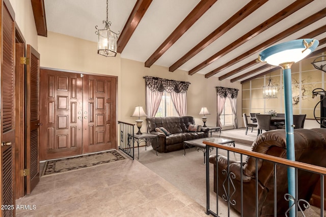 7252 E Edgewood Ave, Mesa, AZ 85208 - carpeted living room with vaulted ceiling with beams, tile patterned flooring, and an inviting chandelier