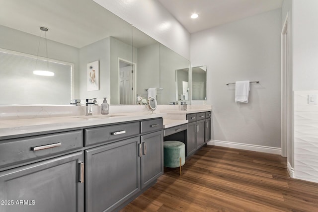 4667 E Reins Rd, Gilbert, AZ 85297 - full bathroom with double vanity, wood finished floors, and baseboards