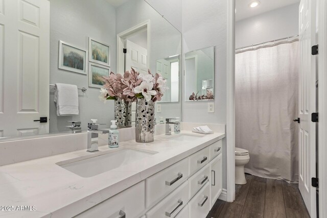 4667 E Reins Rd, Gilbert, AZ 85297 - full bath with toilet, double vanity, hardwood / wood-style floors, and a shower with shower curtain