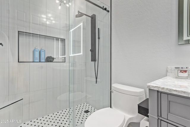 4667 E Reins Rd, Gilbert, AZ 85297 - full bathroom with vanity, a shower stall, and toilet