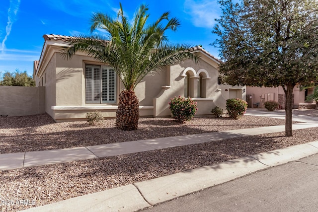 4667 E Reins Rd, Gilbert, AZ 85297 - mediterranean / spanish house with stucco siding