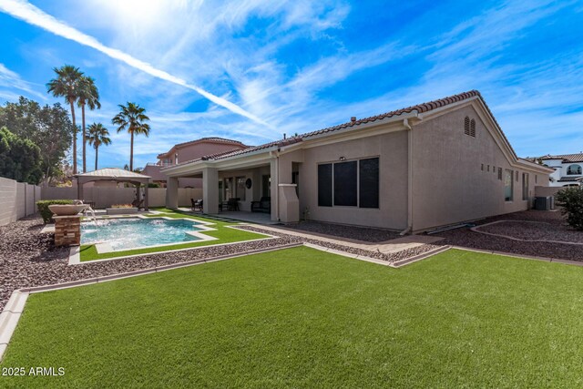 4667 E Reins Rd, Gilbert, AZ 85297 - back of property featuring a gazebo, cooling unit, an outdoor living space, a patio, and stucco siding