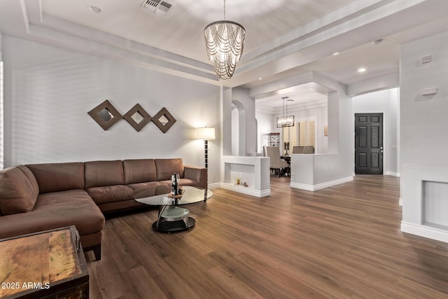 4667 E Reins Rd, Gilbert, AZ 85297 - living area with a chandelier, wood finished floors, baseboards, recessed lighting, and arched walkways