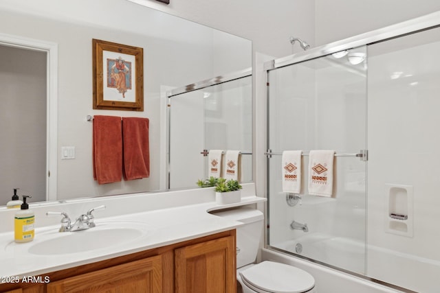 full bathroom with vanity, toilet, and enclosed tub / shower combo