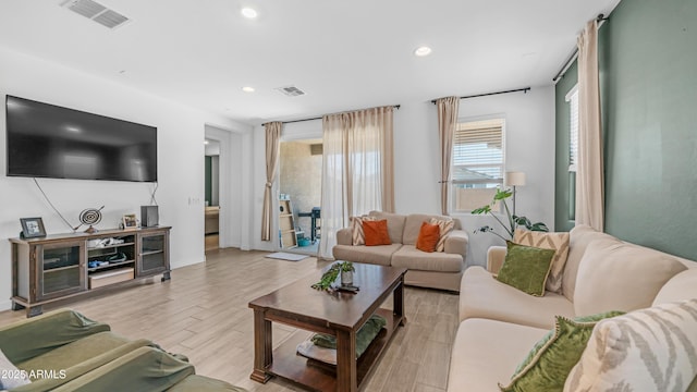 3117 E Hayfield Way, San Tan Valley, AZ 85140 - living room with recessed lighting, light wood-style floors, and baseboards