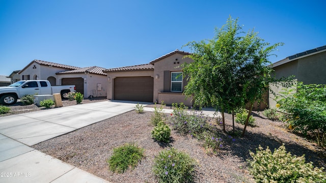 3117 E Hayfield Way, San Tan Valley, AZ 85140 - mediterranean / spanish-style home featuring stucco siding, a garage, concrete driveway, and a tiled roof