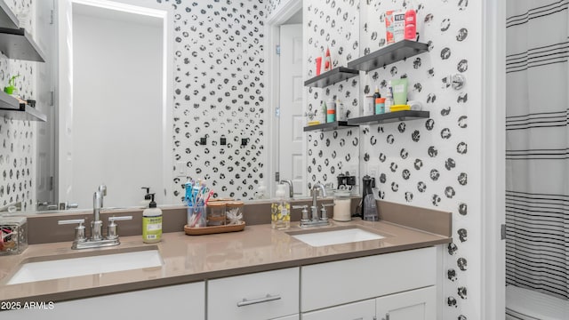 3117 E Hayfield Way, San Tan Valley, AZ 85140 - bathroom with double vanity, wallpapered walls, and curtained shower