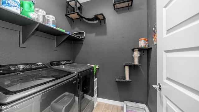 3117 E Hayfield Way, San Tan Valley, AZ 85140 - clothes washing area with independent washer and dryer, light wood finished floors, and baseboards