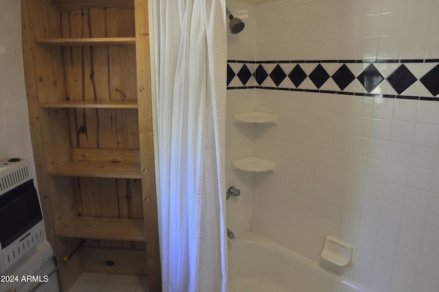 bathroom featuring heating unit and shower / tub combo