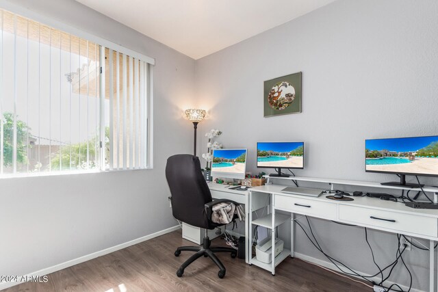 office space featuring dark wood-type flooring