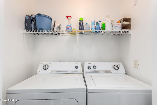 washroom with separate washer and dryer