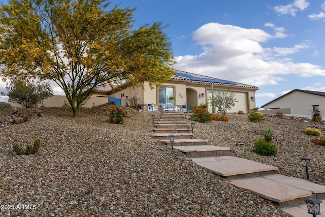 965 Calle Azul, Wickenburg, AZ 85390 - view of front of property featuring solar panels, a tile roof, and stucco siding