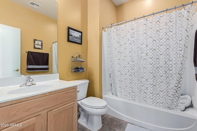 full bathroom with visible vents, toilet, tile patterned flooring, shower / bath combination with curtain, and vanity