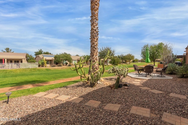 view of yard with a patio and fence