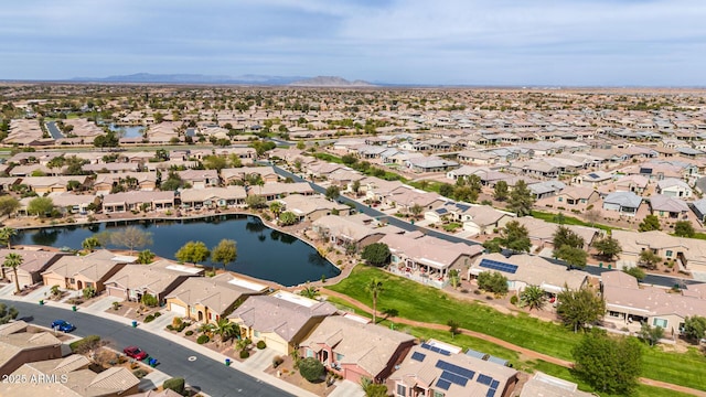 bird's eye view featuring a water view and a residential view