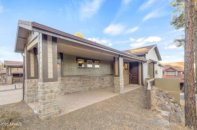 view of front of house featuring stone siding