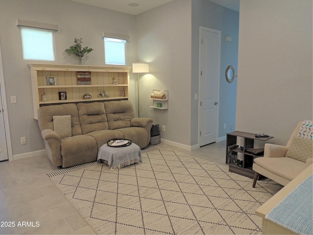 21696 E Arroyo Verde Dr, Queen Creek, AZ 85142 - living room featuring baseboards