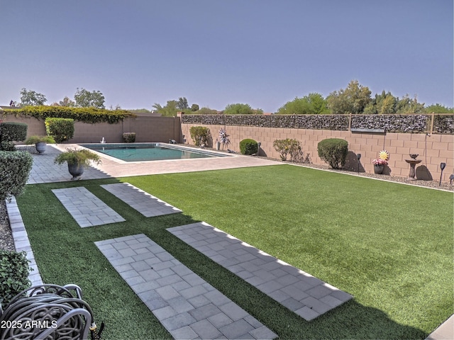 21696 E Arroyo Verde Dr, Queen Creek, AZ 85142 - view of yard with a fenced backyard, a fenced in pool, and a patio