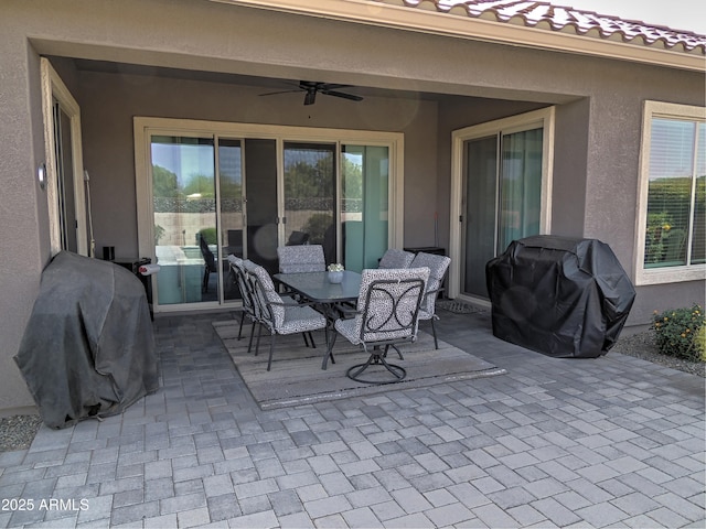 21696 E Arroyo Verde Dr, Queen Creek, AZ 85142 - view of patio with outdoor dining space, a grill, and ceiling fan