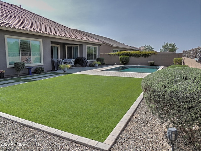 21696 E Arroyo Verde Dr, Queen Creek, AZ 85142 - view of yard with a fenced in pool, a patio, and a fenced backyard