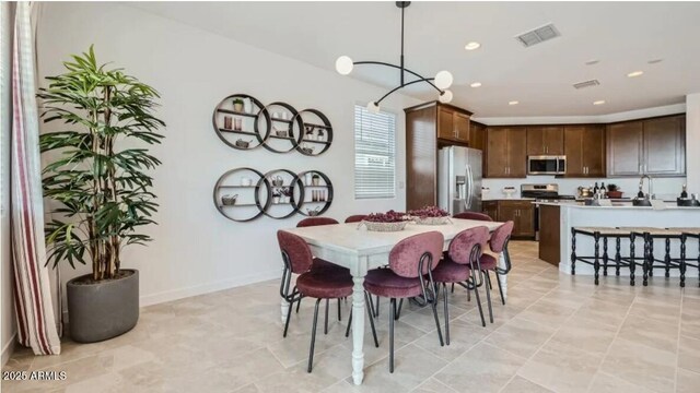 23081 E Saddle Way, Queen Creek, AZ 85142 - dining space featuring recessed lighting, baseboards, and light tile patterned flooring