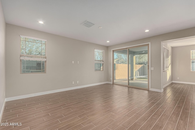 unfurnished room with plenty of natural light