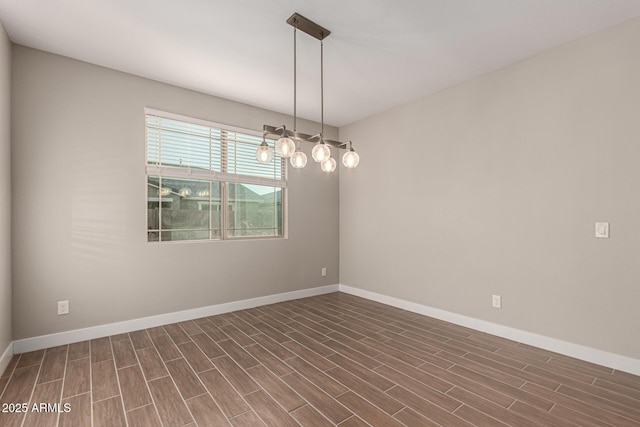 empty room featuring dark hardwood / wood-style flooring