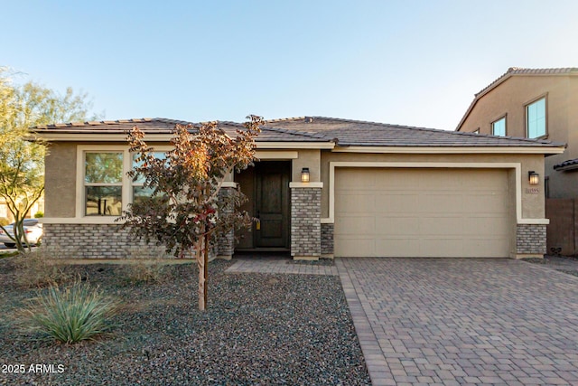 view of front of property featuring a garage