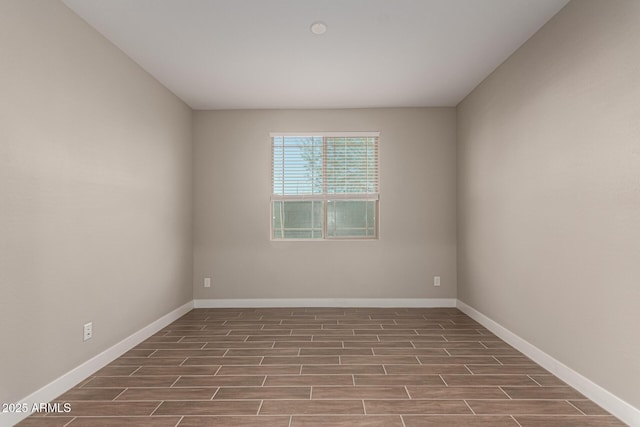 empty room featuring wood-type flooring