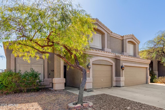 view of front of home with a garage