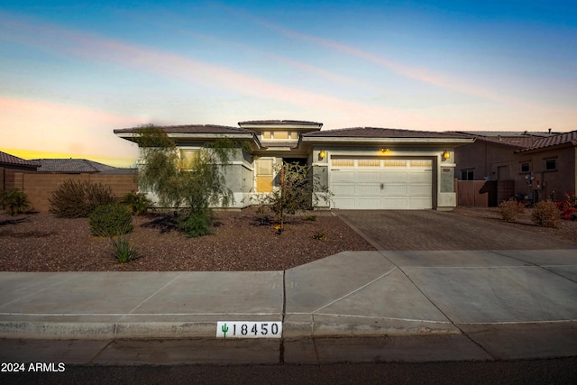 prairie-style house with a garage