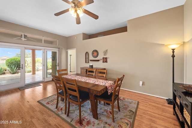11553 W Cottontail Ct, Surprise, AZ 85378 - dining space with ceiling fan, light wood finished floors, and baseboards