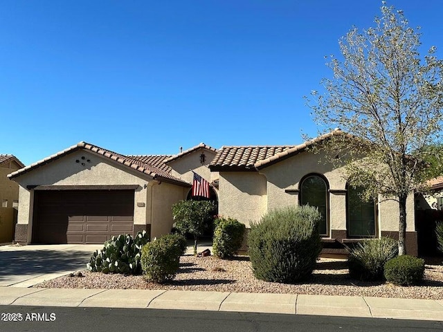 view of front of home with a garage