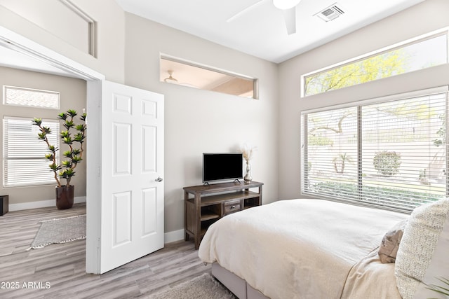 8848 E Conquistadores Dr, Scottsdale, AZ 85255 - bedroom with light wood-style floors and a ceiling fan