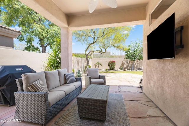 8848 E Conquistadores Dr, Scottsdale, AZ 85255 - fenced backyard featuring a ceiling fan, a grill, a patio, and outdoor lounge area