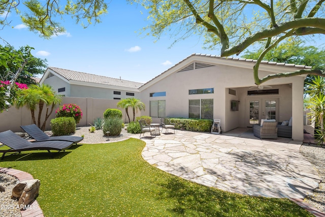 8848 E Conquistadores Dr, Scottsdale, AZ 85255 - back of house featuring french doors, stucco siding, and a patio area