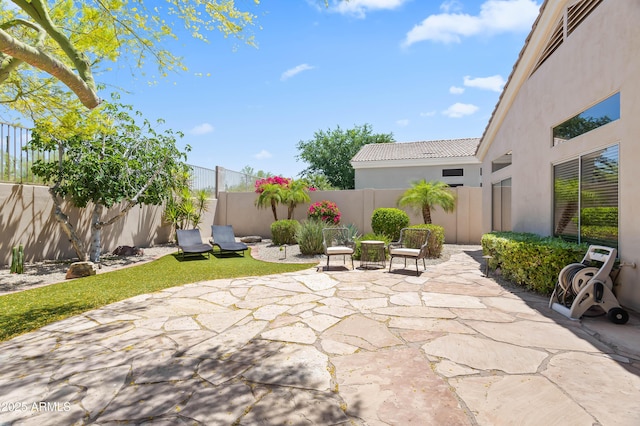 8848 E Conquistadores Dr, Scottsdale, AZ 85255 - fenced backyard featuring a patio area